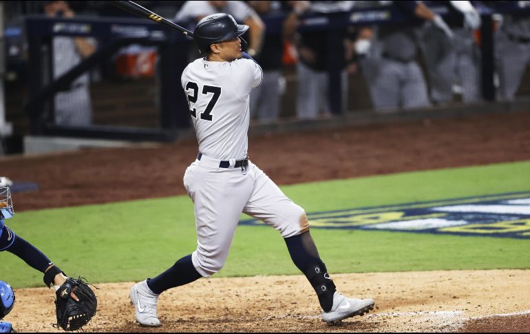 Con cuatro jonrones, uno de ellos Grand Slam de Giancarlo Stanton, los Yankees vencieron a los Rays de Tampa Bay en los playoffs de las Grandes Ligas. EFE / J. M. Mabanglo