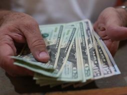 En la sesión del lunes, el dólar finalizó en menos de 22 pesos por primera vez en dos semanas. EL INFORMADOR/ARCHIVO