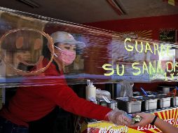 El 30.9% del  tiempo total de trabajo de la población para las mujeres corresponde al realizado para el mercado. AFP/ARCHIVO