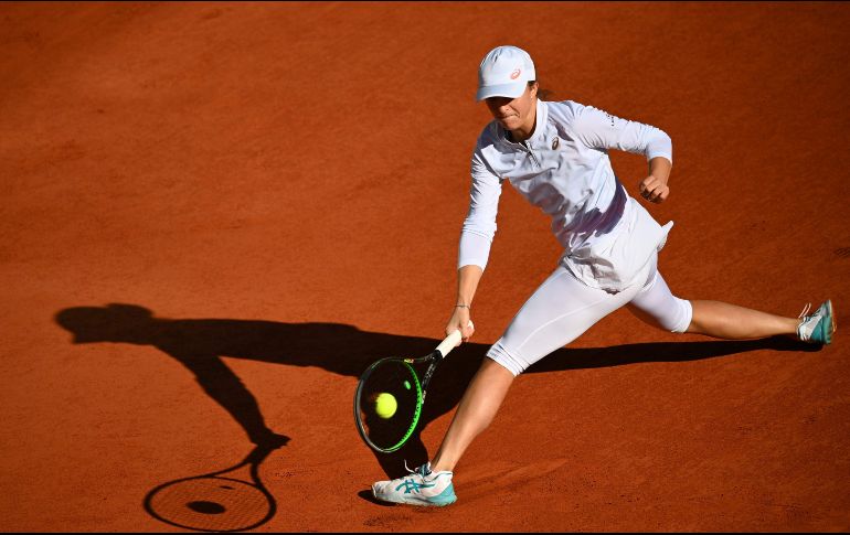 Swiatek, se convierte en la ganadora más joven de Roland Garros desde Monica Seles en 1992 y la primera en hacerlo sin conceder un set desde Chris Evert en 1974. AFP / A. C. Poujoulat