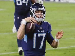 LÍDER. Ryan Tannehill capitalizó las oportunidades que le otorgó su defensiva y totalizó cuatro anotaciones, tres de ellas por la vía aérea y una más acarreando el ovoide. AFP • F. Breedon