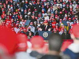 Sin distancia. Donald Trump, durante un mitin en Wisconsin. AFP