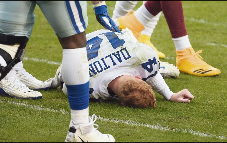 NOQUEADO. Andy Dalton salió conmocionado en el tercer cuarto del juego de la semana pasada en Washington. AFP• P. McDermott