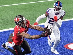 DIFERENCIA. Mike Evans (#13) hizo la recepción anotadora que fue clave para el triunfo de Tampa Bay. AFP • S. Stier