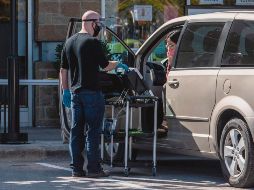 En Texas los ciudadanos pudieron votar sin bajarse del coche. AFP