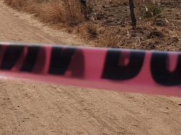 El cadáver es encontrado tirado en la calle, afuera de un baldío. ESPECIAL/ARCHIVO