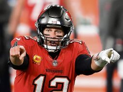 Tom Brady se disputa con Drew Brees el primer sitio de más pases de anotación de la historia; esta noche es su rival. AFP/S. Stier