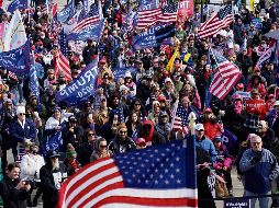EN CALLE. Los inconformes con el triunfo de Biden decían de Trump: “El mejor presidente de la historia”.  AP