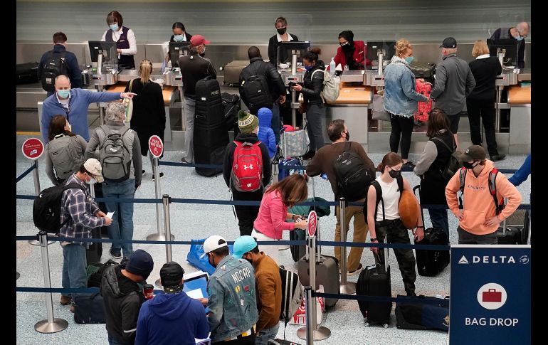 Una fila para registarse en vuelos en Minneapolis, en Minnesota. AP/StarTribune/D. Joles