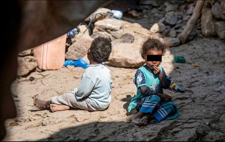 Los efectos de la pandemia del coronavirus COVID-19 pueden empujar a 207 millones de personas a la pobreza extrema para 2030, elevando el total en el mundo por encima de los mil millones. AFP / A. Al-Basha