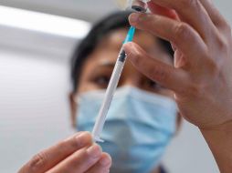 Se espera que esta semana se firme el contrato final con el laboratorio chino CanSino Biologics por 35 millones de dosis para entrega entre enero y septiembre del próximo año; esta vacuna será envasada en nuestro país. AFP / J. Hill