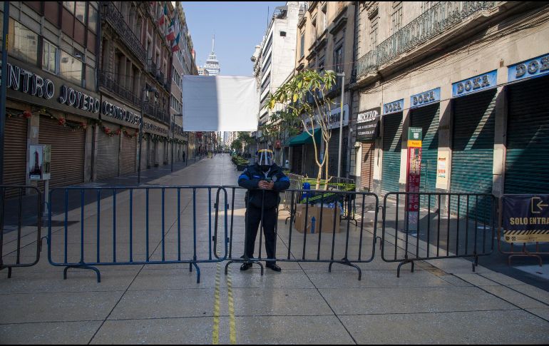El cierre de actividades en los últimos días de 2020 para evitar contagios de coronavirus traerá una importante baja en la derrama económica. AFP/ARCHIVO