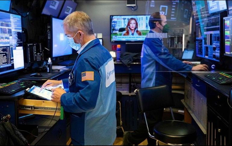 Por sectores, sólo el tecnológico, el de bienes no esenciales y el de comunicaciones cerraron la jornada en verde. AP/C. Ziemer