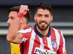“PISTOLERO”. Luis Suárez llegó a 14 tantos con su doblete de ayer y encamina al Atlético al título. AFP• C. QUICLER