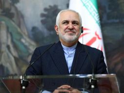 “Claramente puede haber un mecanismo para sincronizar el regreso de los dos países al acuerdo o para coordinar lo que se puede hacer”, agregó Javad Zarif. AFP