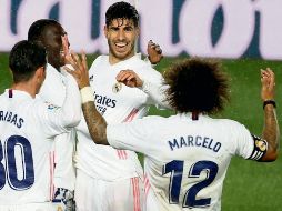 GRITO DE GOL. Los jugadores del Real Madrid festejaron con mucha emoción la caída del segundo tanto. EFE