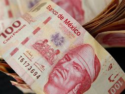 La ganancia de la moneda mexicana fue de 0.4% u ocho centavos con relación al miércoles. EL INFORMADOR/ARCHIVO