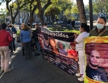 Un grupo de activistas y familiares se manifestó afuera del edificio del Congreso estatal a la espera de que se aprobara la nueva legislación. EL INFORMADOR/ R. Rivas