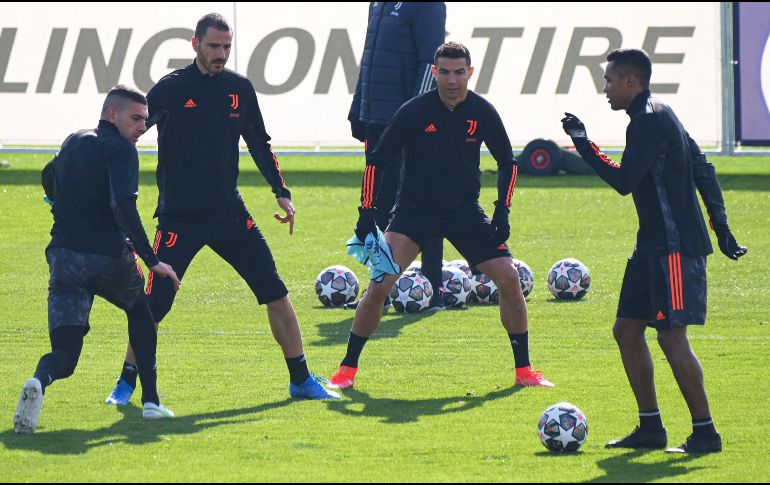 Cristiano Ronaldo regresa a su Portugal natal para desafiar a los Dragones del Porto con la Juventus de Turín. AFP / M. Bertorello