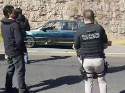 Se localizaron cuatro casquillos de arma larga esparcidos alrededor del vehículo. AFP /ARCHIVO