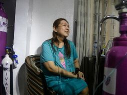 Dolores musculares y en el pecho, fatiga, problemas de respiración y lagunas mentales, entre otros, son síntomas del COVID-19 persistente. AP/S. Alamba