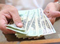 En las últimas cinco sesiones, el tipo de cambio tocó un mínimo de 20.35 pesos por dólar y un máximo de 21.048. EL INFORMADOR/ARCHIVO