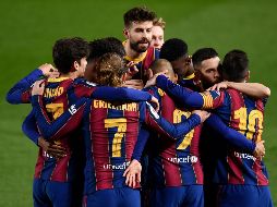 Barcelona consiguió la hazaña al remontar el marcador en contra frente a Sevilla. AFP / J. Lago