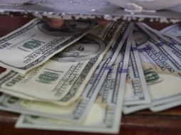 El peso cede terreno al dólar debido a la percepción de riesgo sobre México. EL INFORMADOR/ARCHIVO