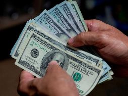 En operaciones al menudeo, CitiBanamex vende el dólar en 21.56 pesos, 17 centavos más caro que ayer. EFE/ ARCHIVO