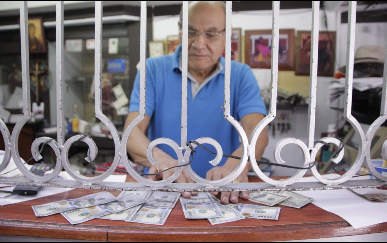 La reforma eléctrica y tensiones en Estados Unidos influyen al comportamiento de la moneda mexicana frente al dólar. EL INFORMADOR / ARCHIVO