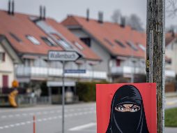 La ley aprobada en este referéndum también se aplicará a los participantes en manifestaciones y marchas, que no podrán ocultarse el rostro. AFP / F. Coffrini