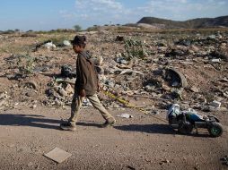 Varias generaciones de familias se han nutrido del vertedero de Pavia y sus técnicas de recolección se transmiten de generación en generación. AP/A. Cubillos