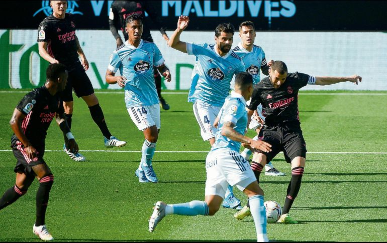 ENCENDIDO. Karim Benzema suma cinco juegos seguidos con gol. Ayer marcó un doblete. AFP
