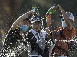 MONARCA. La golfista tailandense tenía una ventaja cómoda que por poco se vio alcanzada por la australiana Lydia Ko. AFP • M. Owens