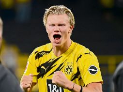 MURALLA. El delantero noruego tendrá que romper una zaga muy poco vulnerada. AFP