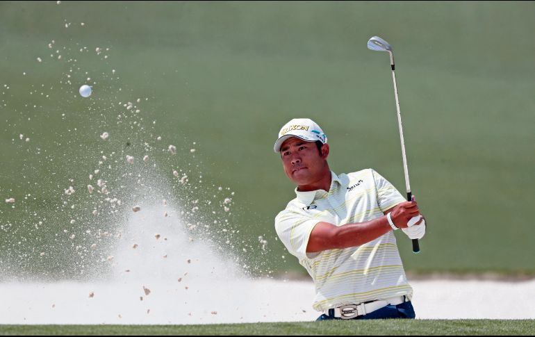 NUEVOS AIRES ORIENTALES. El golf mostrado por el nipón, rubricado con la chaqueta verde, abre el camino hacia un mejor futuro, señaló Tiger Woods, quien felicitó al campeón del máximo torneo masculino. AP