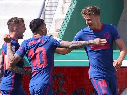 Marcos Llorente hizo remecer las redes con un disparo a su llegada al área, después de aprovechar una diagonal retrasada del belga Yannick Carrasco a los 23 minutos. AFP / J. Jordan