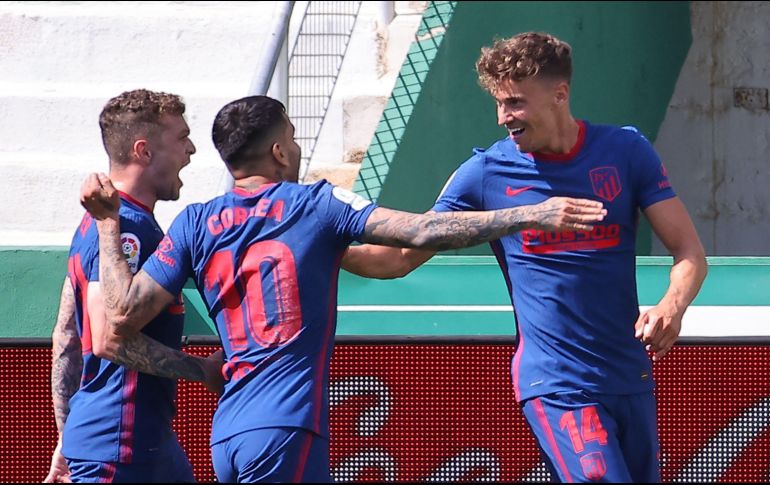 Marcos Llorente hizo remecer las redes con un disparo a su llegada al área, después de aprovechar una diagonal retrasada del belga Yannick Carrasco a los 23 minutos. AFP / J. Jordan