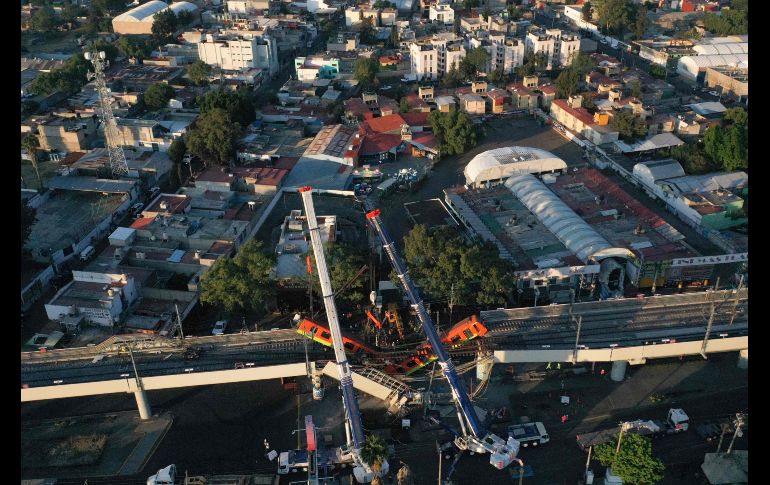 La mañana del martes se realizaban labores de remoción del vagón. AFP/P. Pardo