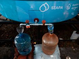 El SIAPA  ha colocado 143 cisternas comunitarias, de 10 mil litros de capacidad, en colonias de las zonas altas. ESPECIAL / SIAPA