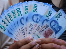 El peso mexicano sorprendió a propios y extraños durante 2022, pues a inicios de este año, el consenso de analistas estimaba que la paridad estaría por estas fechas en 21.60 unidades. NTX / ARCHIVO