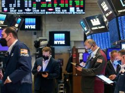 Por sectores, terminaron en verde el tecnológico y el de comunicaciones, mientras que el mayor golpe se lo llevaron el energético y el de materiales básicos. AP/C. Crow