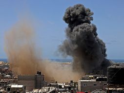 Horas antes del anuncio se observaron bombardeos de Israel en la Franja de Gaza. AFP/S. Khatib