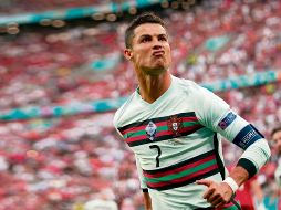 INDOMABLE. El delantero portugués anotó un doblete para darle el triunfo a su equipo y además logró alzarse como el mejor goleador en la historia de las Eurocopas, venciendo al histórico francés Michel Platini. EFE