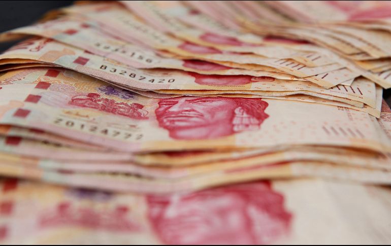 Este jueves, la moneda mexicana terminó en 19.86 unidades por dólar; su cierre más fuerte desde el 10 de junio. EL INFORMADOR / ARCHIVO