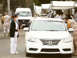 Elementos del Ejército y del Sector de la Salud aplican vacunas contra el coronavirus en  Ensenada. EFE/A. Zepeda