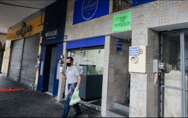 Comerciantes lamentan  el cierre de negocios, pues afirman que recién comenzaban a recuperarse luego de la pandemia del COVID-19. EL INFORMADOR / G. Gallo