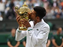 Djokovic también se convirtió en el primer hombre desde Rod Laver en 1969 que conquista los tres primeros grandes en una temporada. EFE / N. Hall