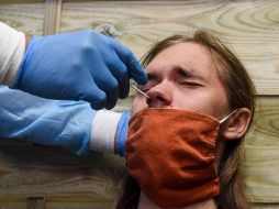 La variante Delta comienza a manifestarse luego de los cuatro días de la exposición con otra persona infectada. AFP/S. Salom-Gomis