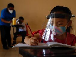 El 30 de agosto, los alumnos de educación básica podrán volver a clases presenciales tras el encierro por la pandemia de COVID-19, aunque de manera opcional. AP / ARCHIVO